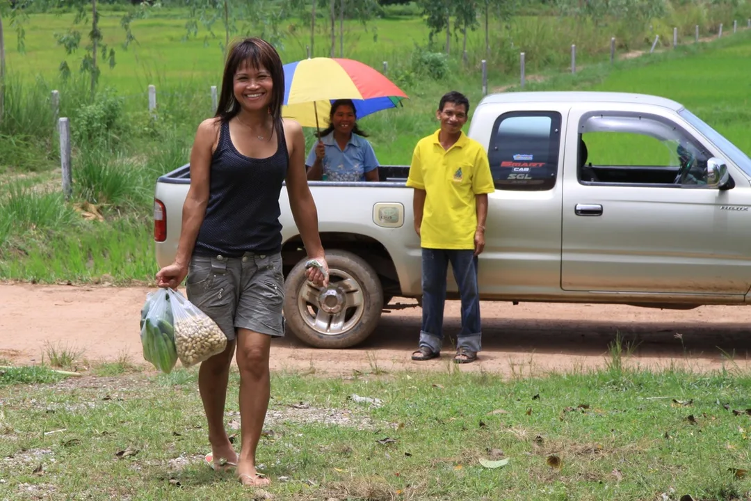 Door to door selling, Thailand. Amporn.