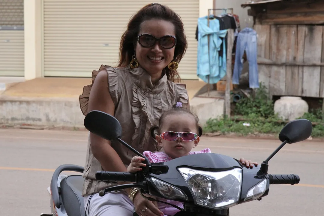 A matching couple on motorbike in Thailand