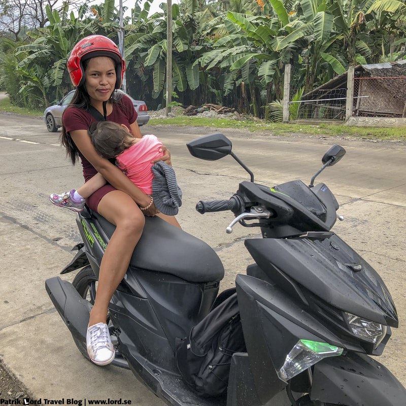 Girls and the motorbike, Dumaguete, Philippines © Patrik Lord Travel Blog