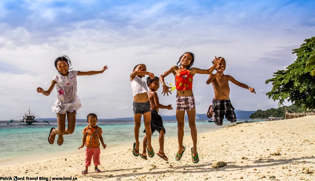 Kids of Philippines, jumping kids, Talikud Island, Mindanao Philippines © Patrik Lord Travel Blog