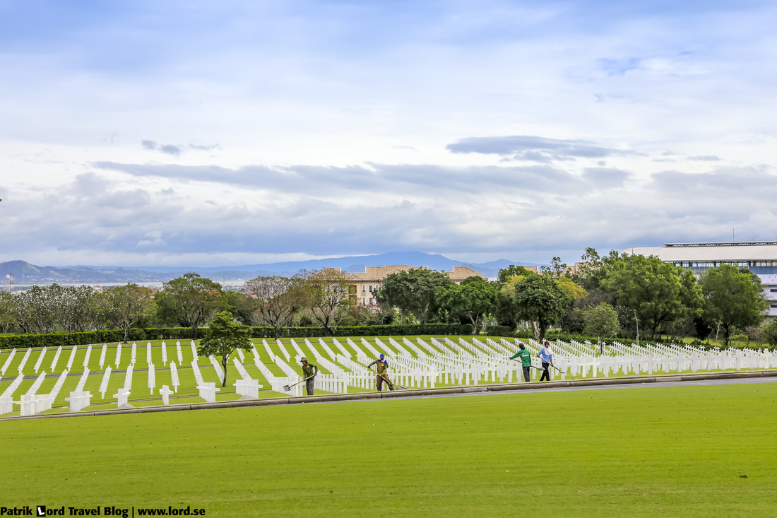 Manila American Cemetery, Workers maintaining the cemetery, Manila, Philippines © Patrik Lord Travel Blog