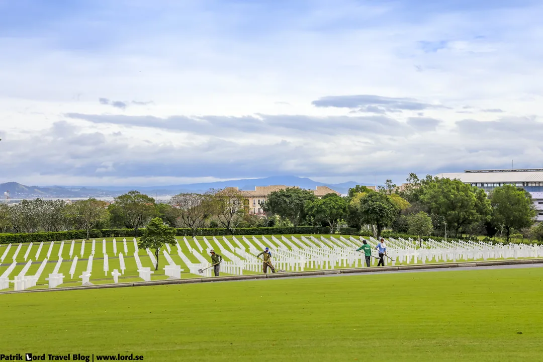 Manila American Cemetery, Workers maintaining the cemetery, Manila, Philippines © Patrik Lord Travel Blog