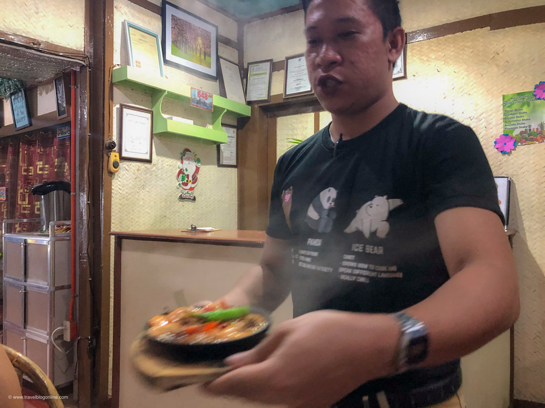 Sizzling Republic Restaurant, Rio Tuba, Palawan, Philippines © www.travelblogonline.com, staff serving the food