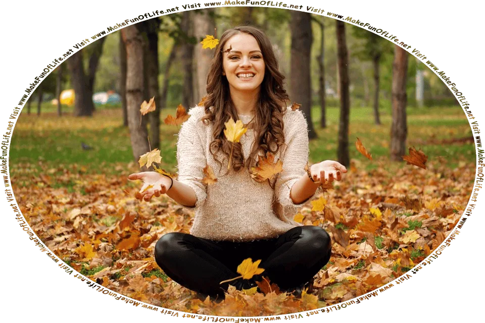 Picture of a happy smiling woman sitting cross-legged on the tree-leaf-covered green grassy ground of a park on an Autumn day, and the words, Visit www.MakeFunOfLife.net.
