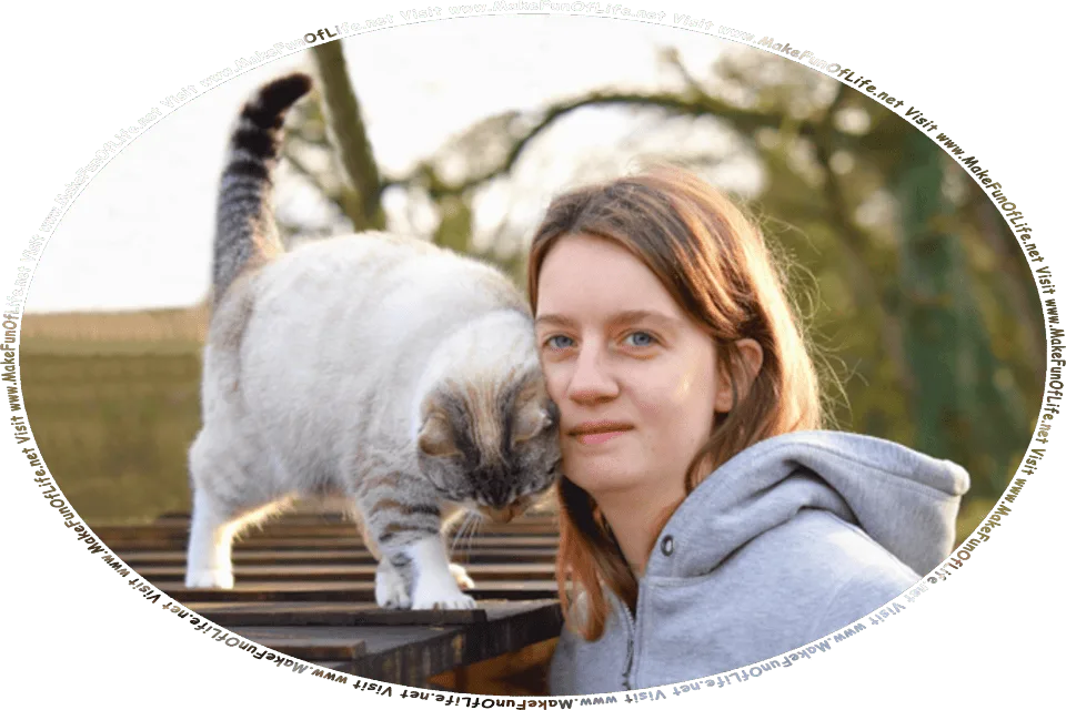Picture of a domestic cat nuzzling a young woman’s face, and the words, Visit www.MakeFunOfLife.net.