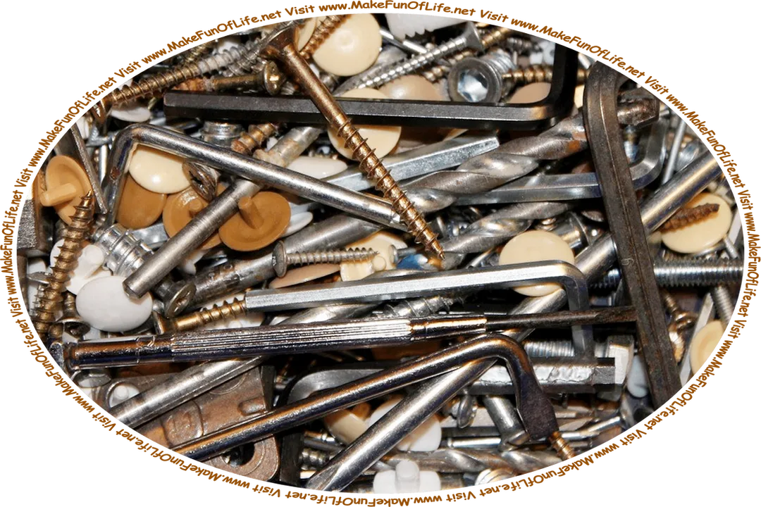 Picture of a jumble of leftover metal and plastic parts and small tools that might typically accompany products requiring some assembly, and the words, ‘Visit www.MakeFunOfLife.net.’