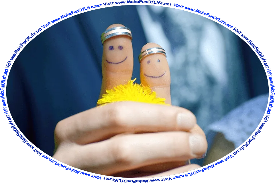 Picture of a bride and groom holding hands, with their thumbs pointing up, smiley faces drawn in blue ink pen on their thumbs, and the words, ‘Visit www.MakeFunOfLife.net.’