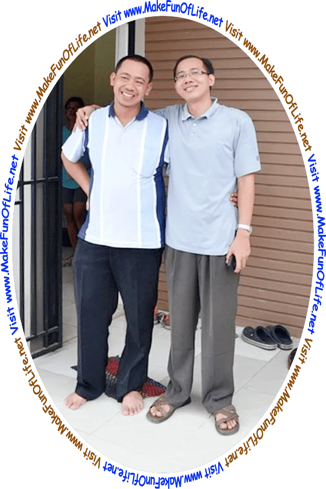 Picture of two happy smiling men who are friends standing side-by-side at the front of a building, and the words, ‘Visit www.MakeFunOfLife.net.’