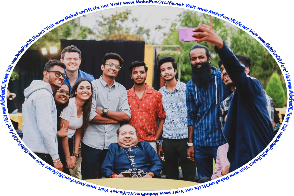 Picture of a group of happy smiling men and women having their picture taken by someone holding a cell phone camera, and the words, Visit www.MakeFunOfLife.net.