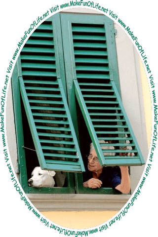 Picture of a woman and a dog poking their heads out of a window in a building, and the words, Visit www.MakeFunOfLife.net.