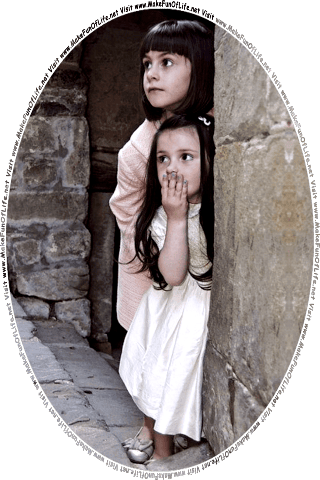 Picture of two girls peering out from the recessed doorway of an old stone building, and the words, Visit www.MakeFunOfLife.net.