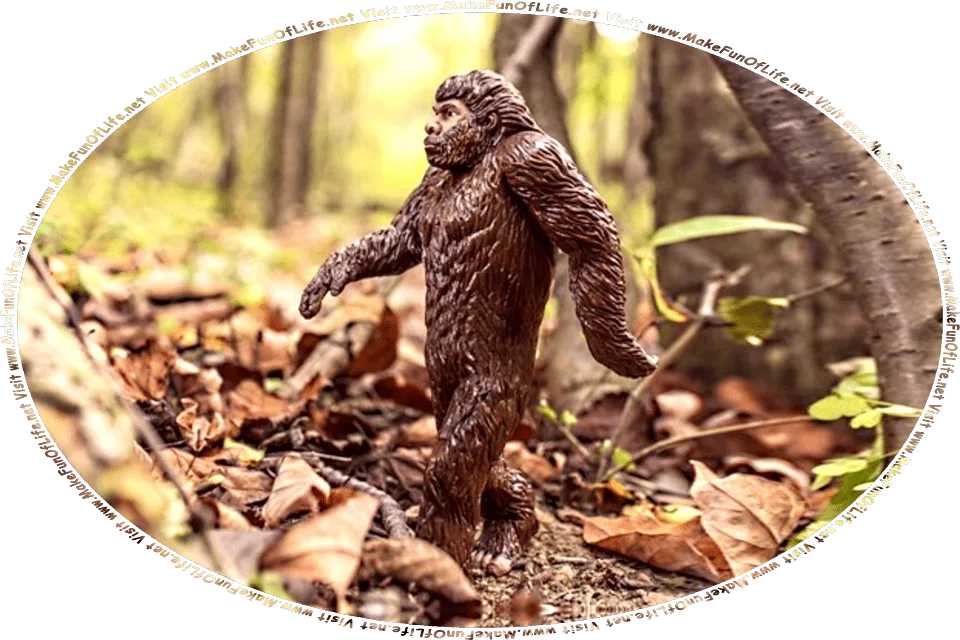 Picture of a Bigfoot toy posable action figure walking through the wilderness, and the words, Visit www.MakeFunOfLife.net.