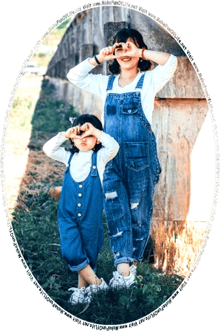 Picture of a mother and her young daughter miming photographers by placing their hands up as if holding cameras and taking pictures, and the words, Visit www.MakeFunOfLife.net.