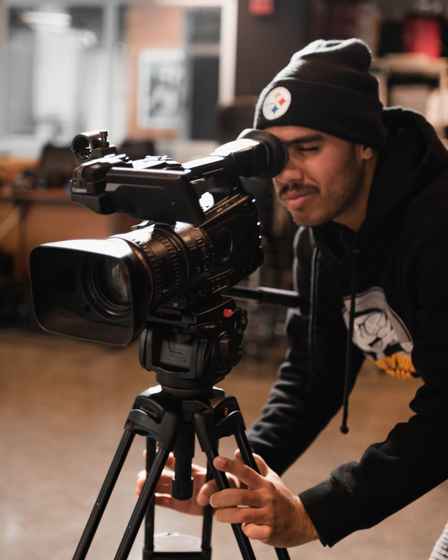 A Screen 2 student records with a studio camera. Photo by Seth Gardner. 