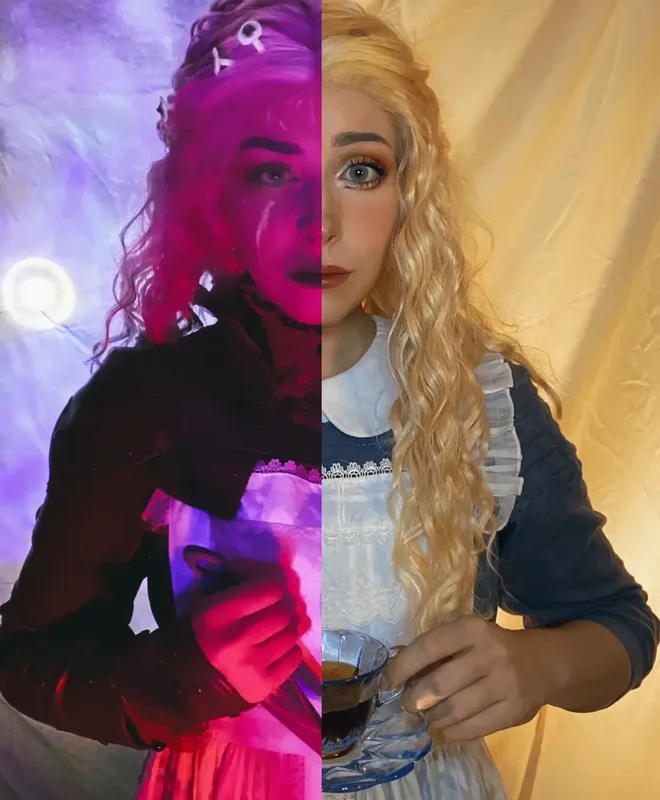Split portrait of the same person in two contrasting personas. The left side is lit in vivid magenta and purple, wearing dark clothing and holding a knife with an intense, haunted expression. The right side is warmly lit in gold tones, wearing a blue dress with a white apron and holding a glass teacup, calm and composed.