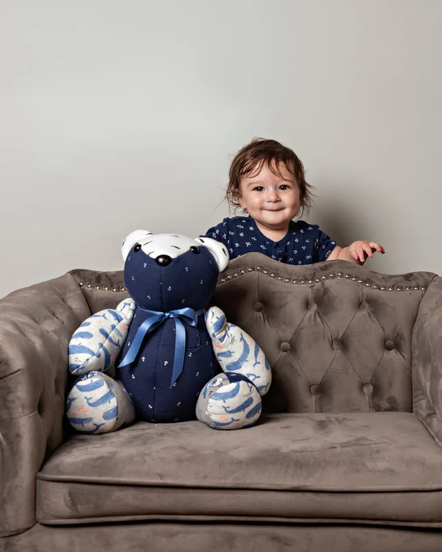 photo of a memory bear by the pretty piggy shop on etsy and a 1 year old baby boy photographed by Laura Pea Photography