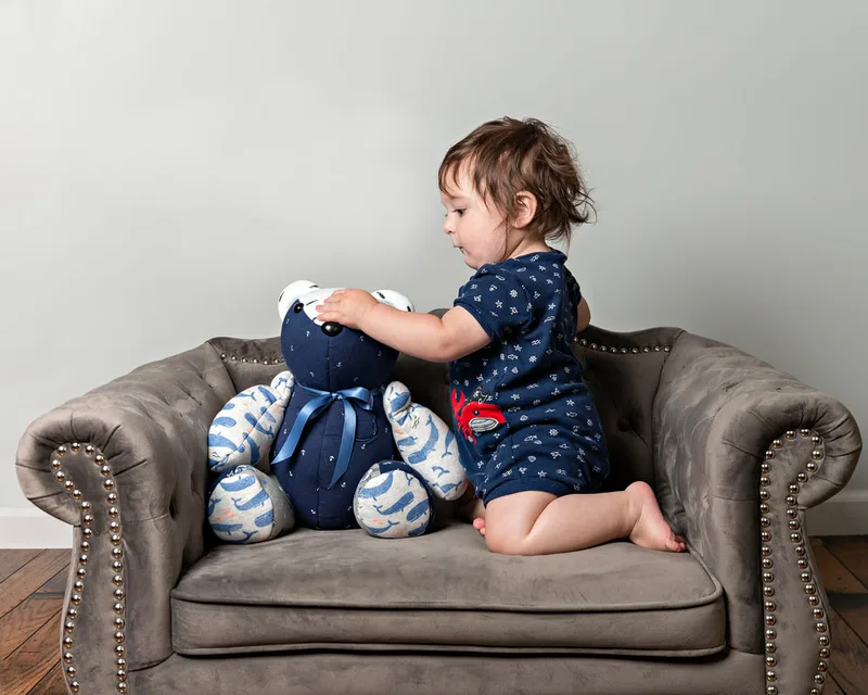 photo of a memory bear by the pretty piggy shop on etsy and a 1 year old baby boy photographed by Laura Pea Photography