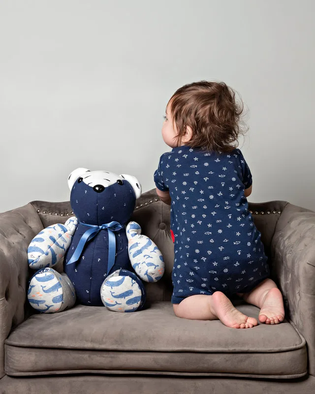 photo of a memory bear by the pretty piggy shop on etsy and a 1 year old baby boy photographed by Laura Pea Photography