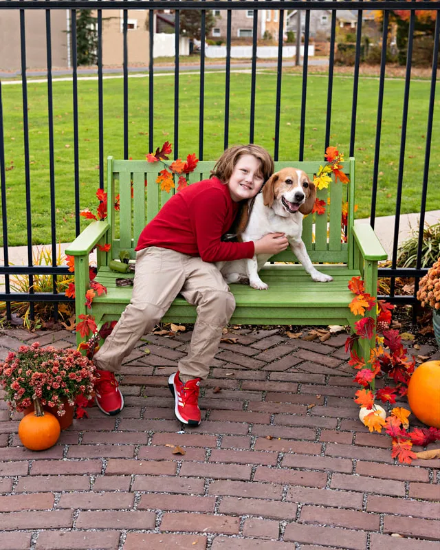 photo of a boy and his beagle