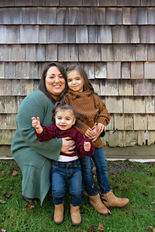 photo of a mom with her daughters