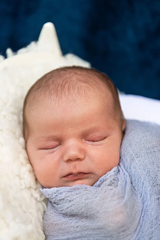 photo of a newborn baby boy close up
