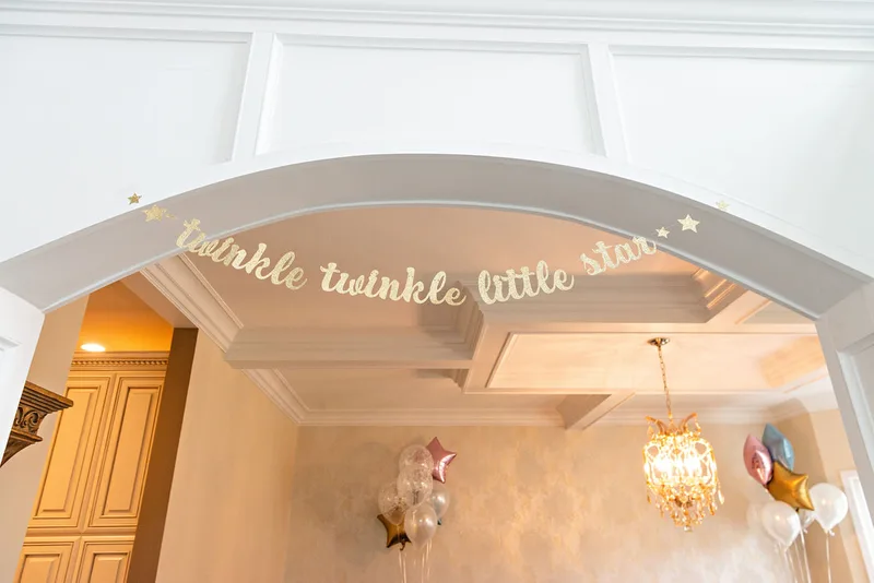 picture of a banner in a hallway reading twinkle twinkle little star