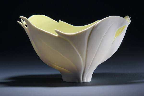 Sculptural translucent porcelain bowl by Antoinette Badenhorst demonstrating the relationship between form, design and the character of porcelain.