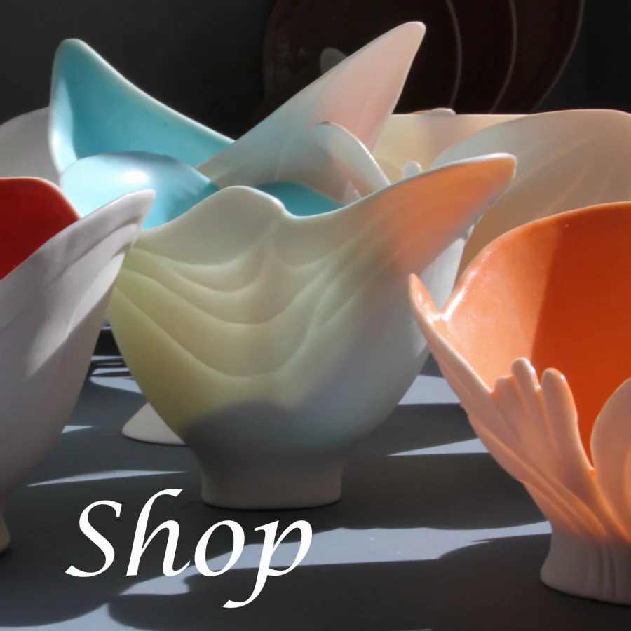 The picture shows a few of the translucent porcelain bowls of Antoinette Badenhorst during sunset in her pottery showroom in Saltillo Mississippi.
