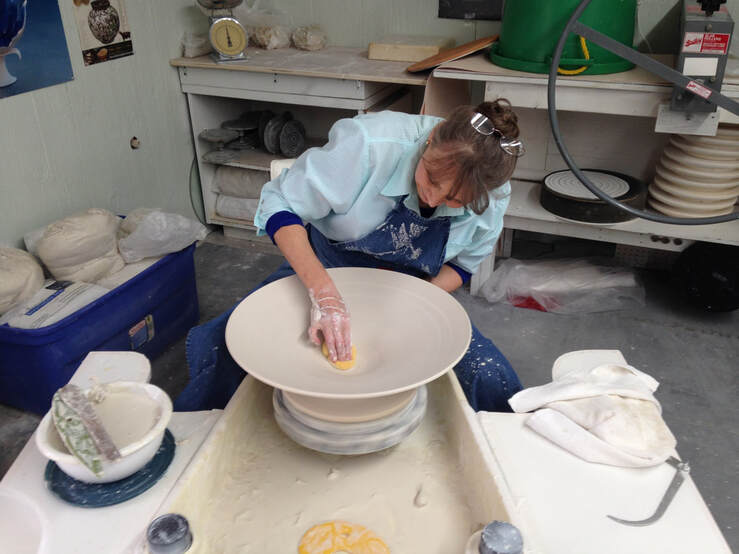 Antoinette demonstrates throwing a large porcelain bowl on the pottery wheel. Wheel-throwing techniques are explored with an emphasis on understanding how porcelain responds throughout the making process.