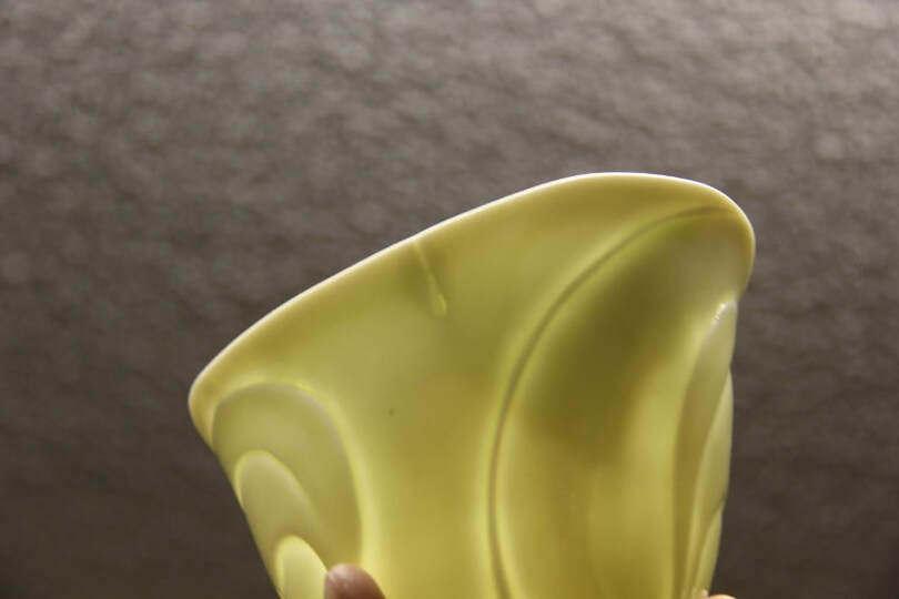 A translucent bowl that show how a fixed crack looks in translucent porcelain after is was fired. 