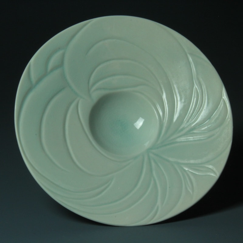 " Whirlwind"  Wheel thrown  and carved  Porcelain plate #9106