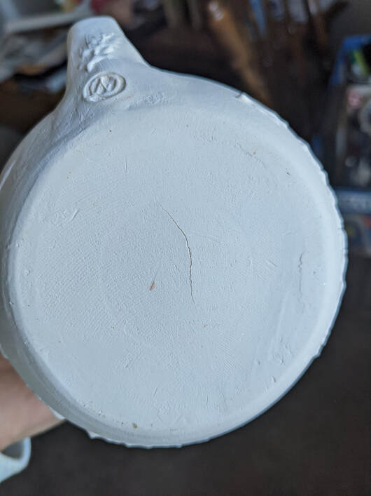 Typical s-crack on the bottom of a cup. 
