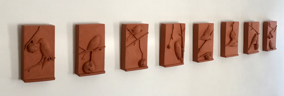 Gayle Fichtinger's terracotta relief installation