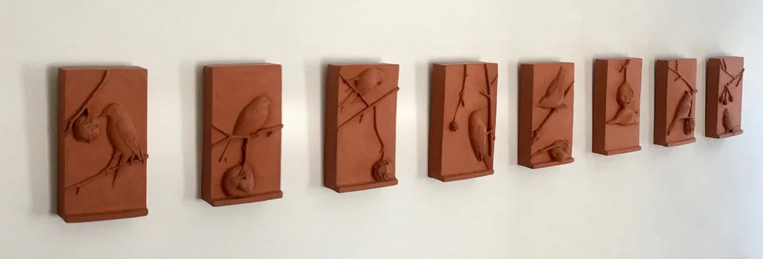 Gayle Fichtinger's terracotta relief installation