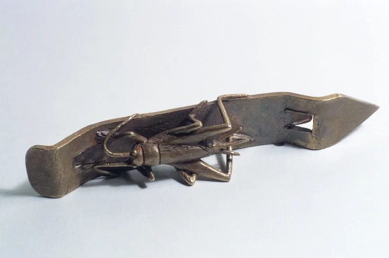 bronze sculpture insect and object