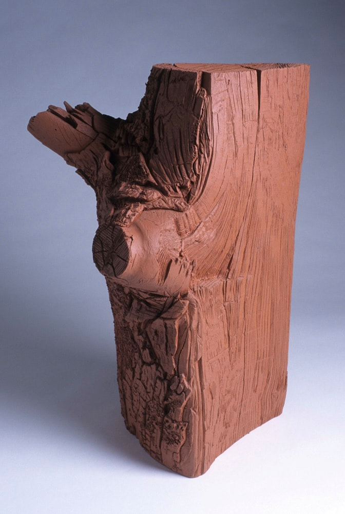ceramic sculpture  of firewood 