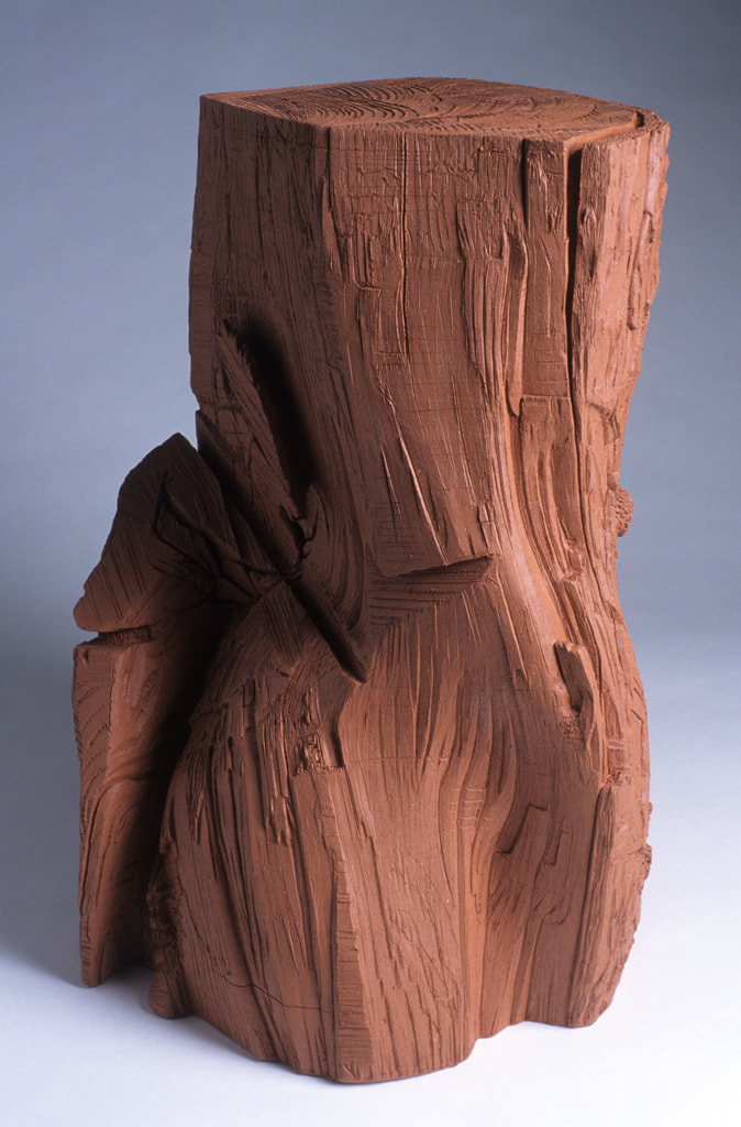 ceramic sculpture of firewood