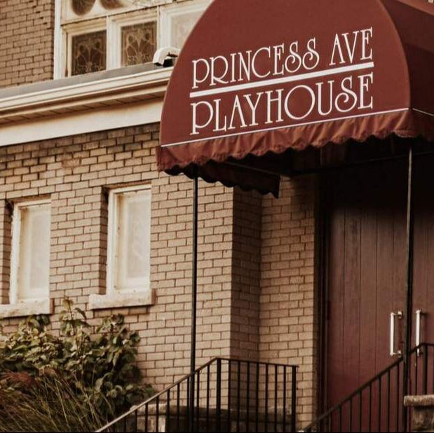 Here is the Princess Ave Playhouse. Over to the right is the double door entrance under a burgundy roof banner with 