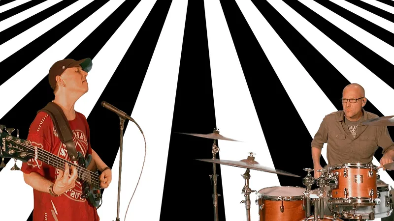 The Rocktronix featuring Chris Blackwell (guitar), Joseph Patrick Moore (bass/vocals), Wayne Viar (drums)