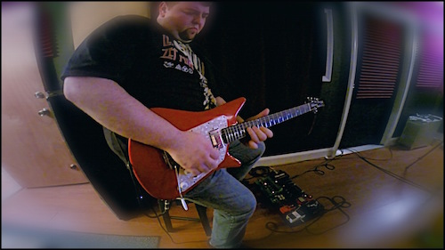Chris Blackwell recording guitar.