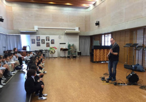Joseph Patrick Moore playing a solo bass at a music school in Tokyo Japan
