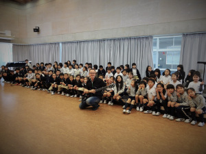 Joseph Patrick Moore teaching a music class in Tokyo Japan