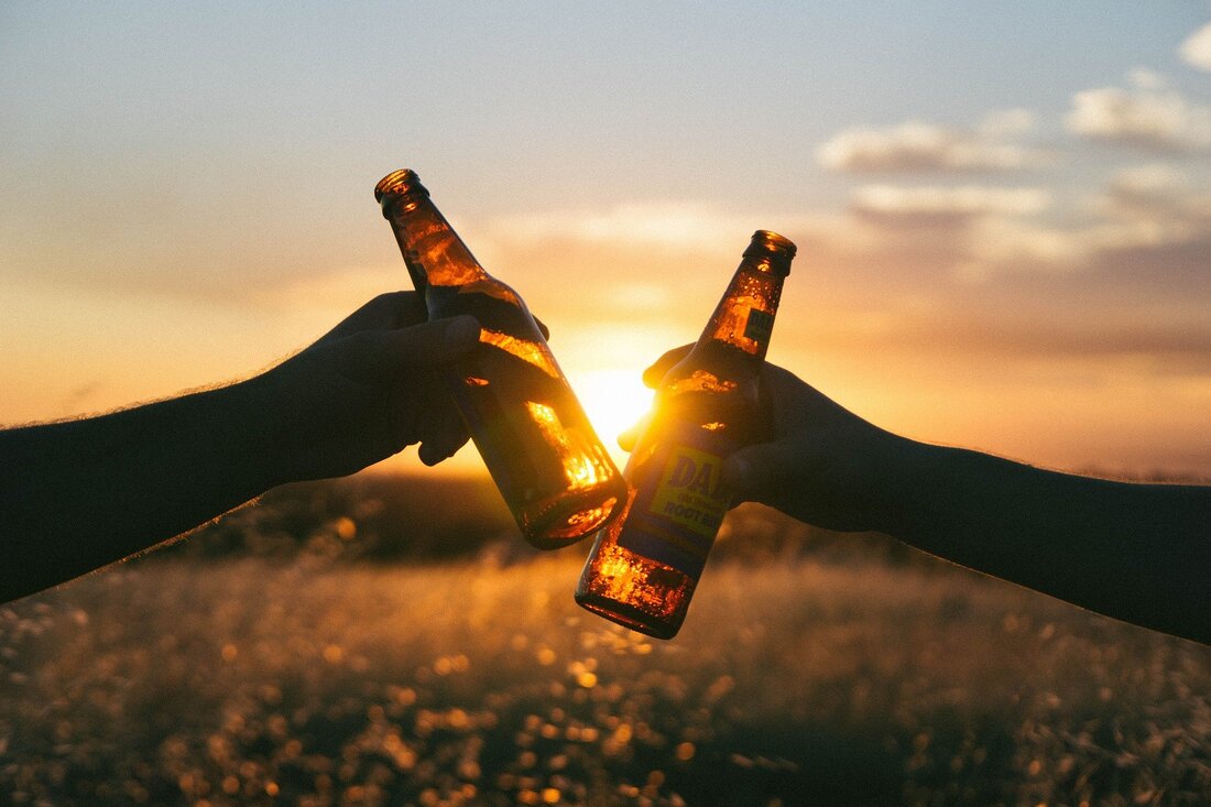 clinking bottles together