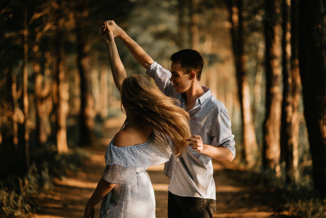 man and woman dancing
