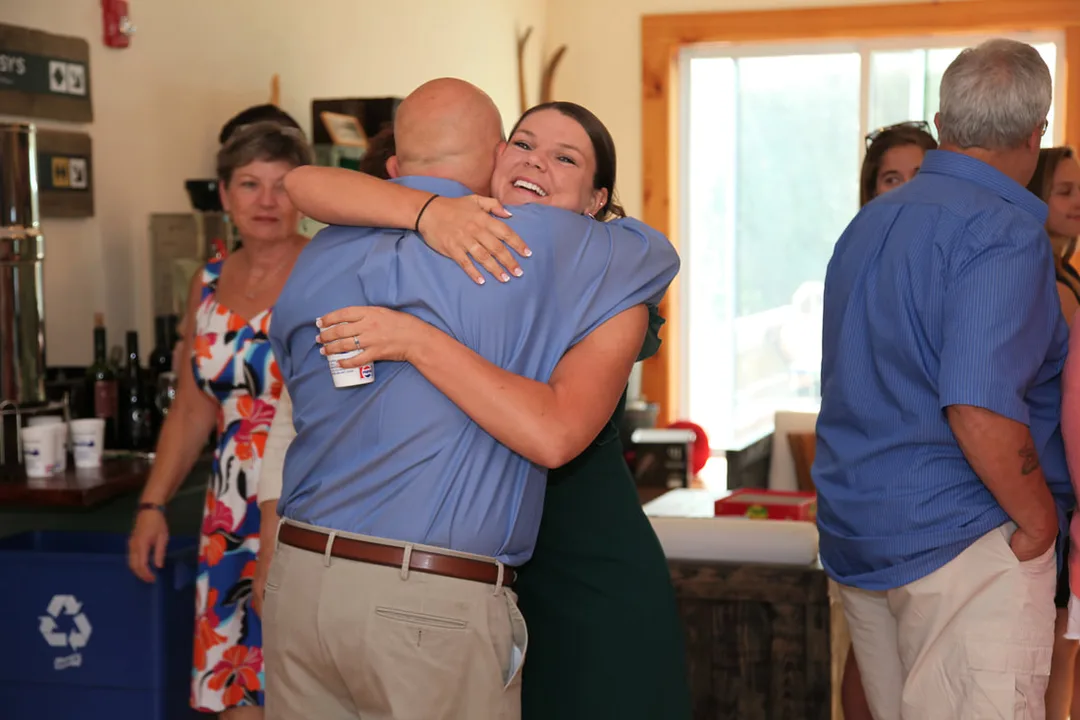 Picture of family members hugging