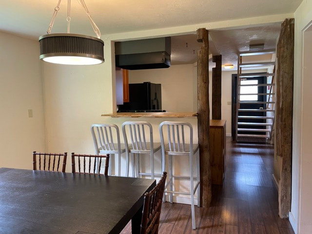 Kitchen with 2 dining room tables