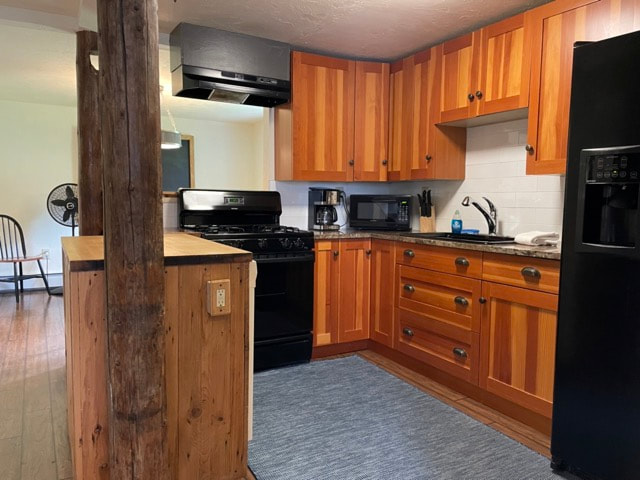 Kitchen with 2 dining room tables