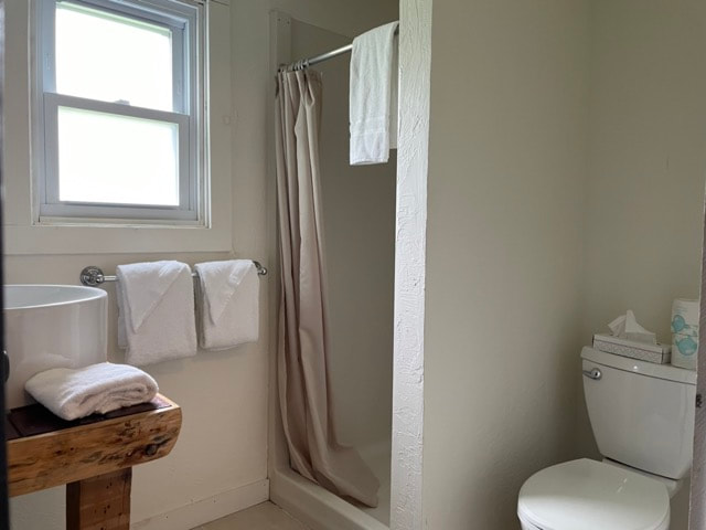 Bathroom #1 with shower, toilet and sink