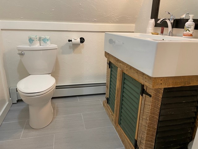 Bathroom with shower, toilet and sink