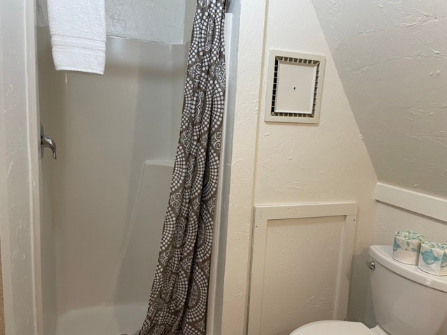 Bathroom with shower, toilet and sink